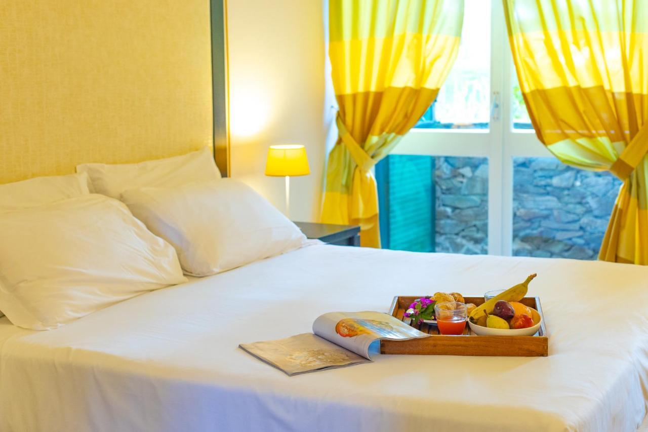 Unahotels Club Hotel Ancora Стинтино Экстерьер фото