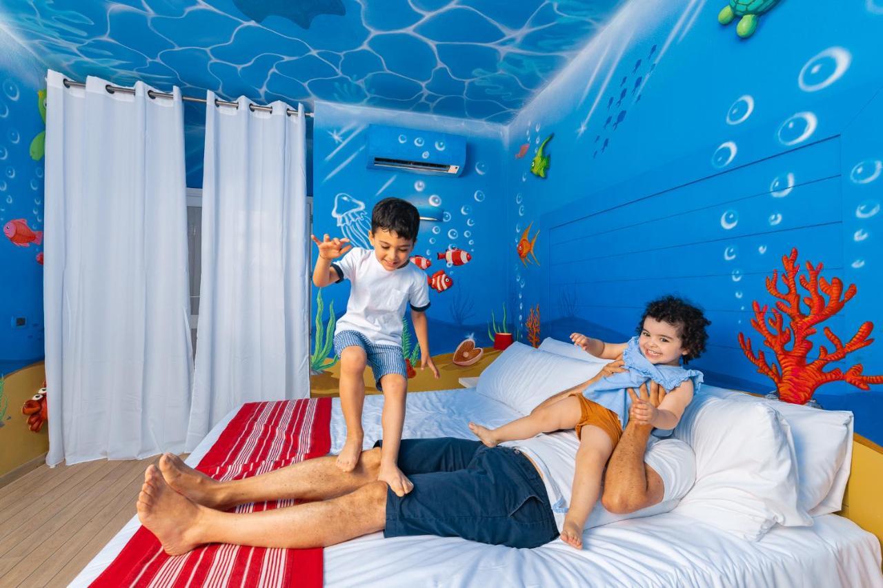 Unahotels Club Hotel Ancora Стинтино Экстерьер фото